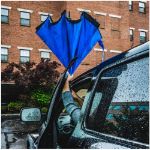 Inverted Umbrella Used with Car